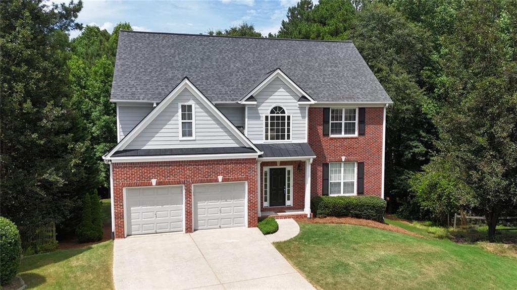 43 Ivy Mist Lane Acworth, GA 30101 - Photo 38 of 58 a front view of a house with a yard