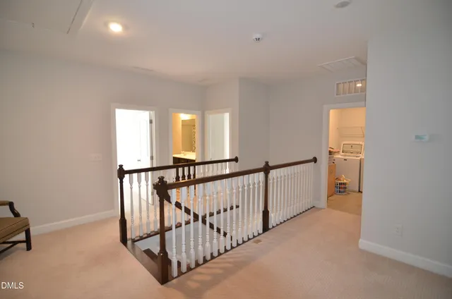 a view of hallway with stairs
