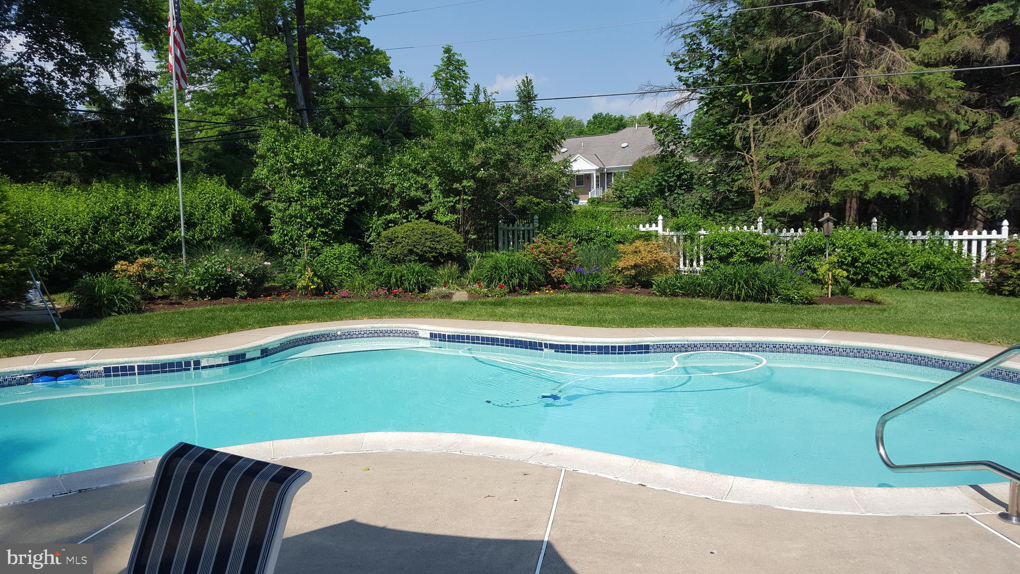 1329 Sugartown Road Berwyn, PA 19312 - Photo 33 of 34 Backyard Pool in Summer