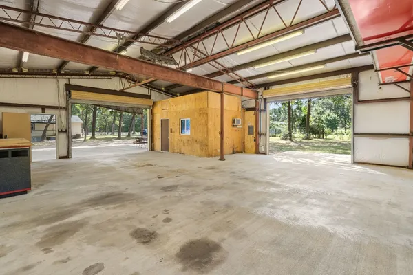 a view of a room with wooden walls