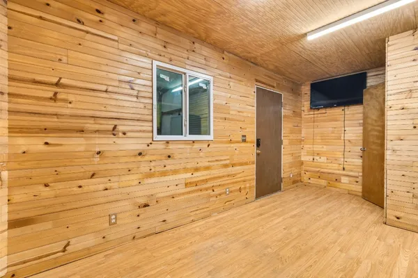 a view of front door of house with an outdoor space