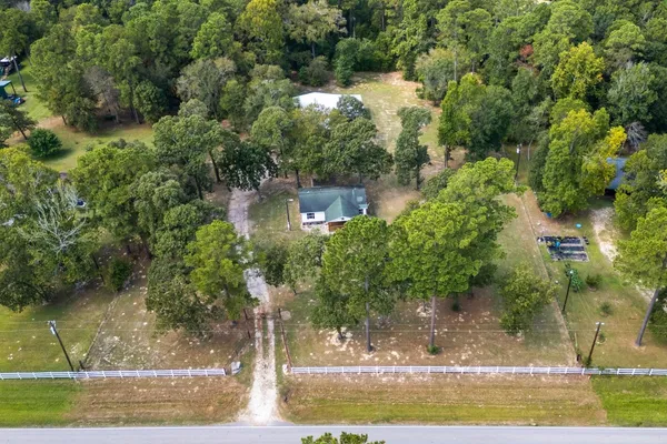 a view of swimming pool with a yard