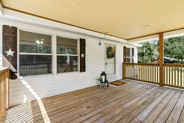 a view of a house with a wooden floor