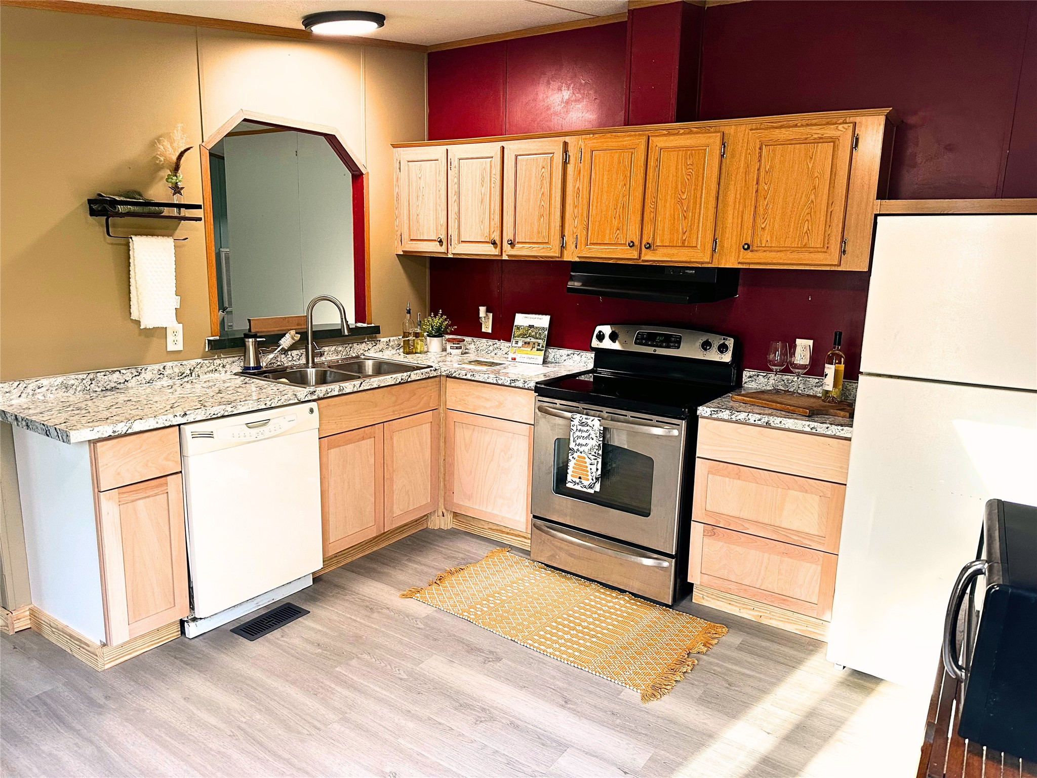 25003 Joseph Road Hockley, TX 77447 - Photo 8 of 47 a kitchen with stainless steel appliances granite countertop a sink stove and refrigerator