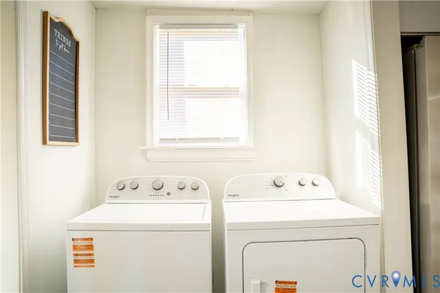 a utility room with dryer and washer