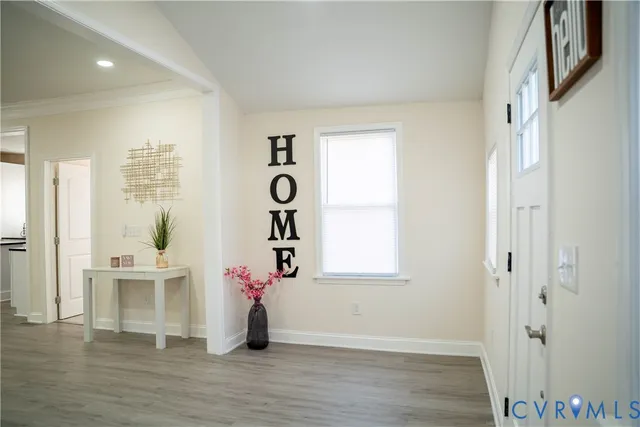 a view of livingroom with furniture and wooden floor