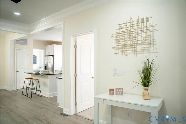 a view of kitchen with furniture and wooden floor