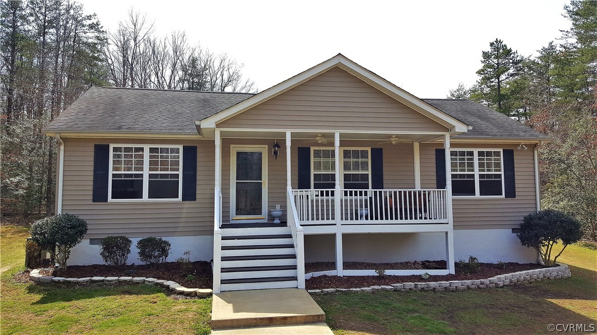 4810 Venable Road Kents Store, VA 23084 - Photo 1 of 22 a front view of a house with a yard