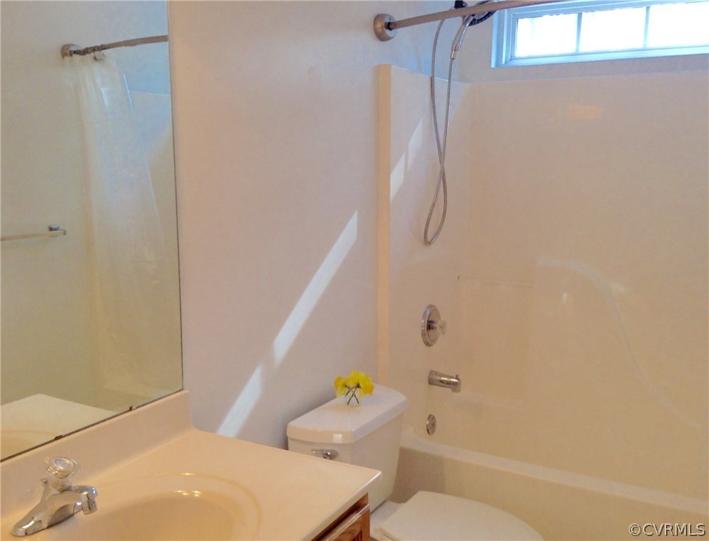 4810 Venable Road Kents Store, VA 23084 - Photo 19 of 22 a bathroom with a sink a toilet and shower