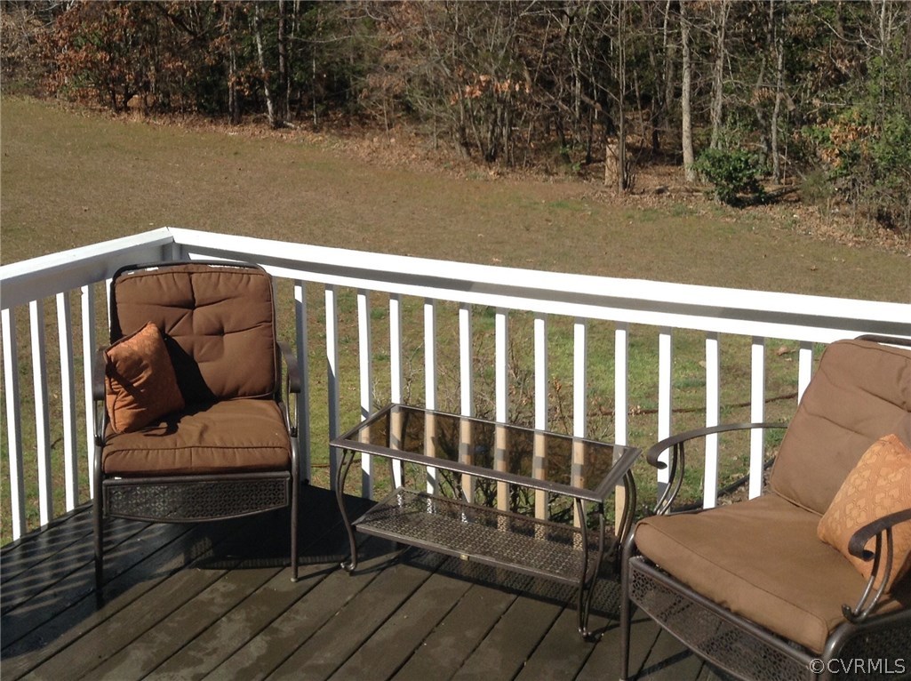 4810 Venable Road Kents Store, VA 23084 - Photo 20 of 22 a view of a chair and wooden floor