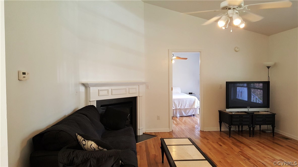 4810 Venable Road Kents Store, VA 23084 - Photo 6 of 22 a living room with furniture and a fireplace