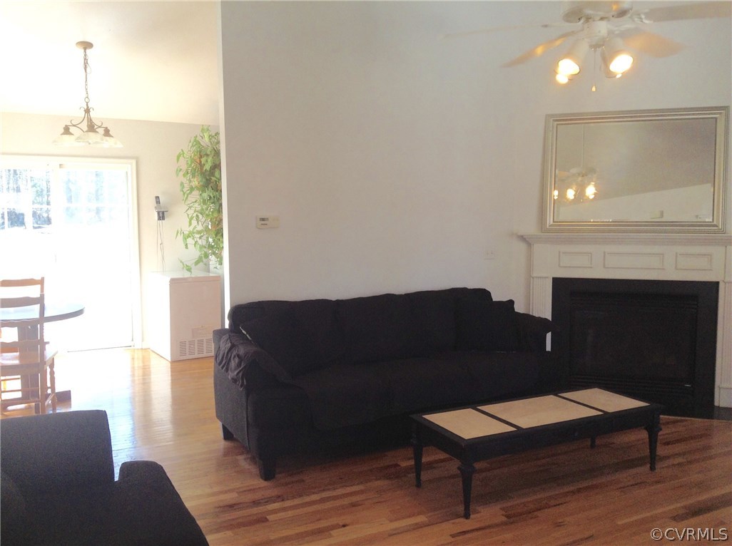 4810 Venable Road Kents Store, VA 23084 - Photo 7 of 22 a living room with furniture and a fireplace