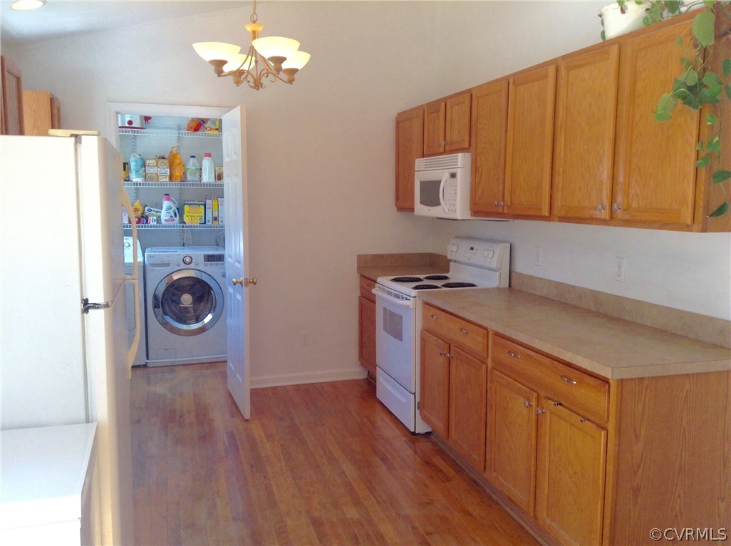 4810 Venable Road Kents Store, VA 23084 - Photo 9 of 22 a utility room with sink dryer and washer