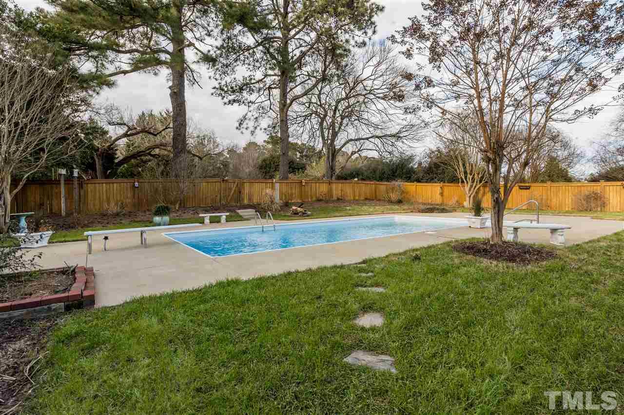 6916 Darcy Lane Raleigh, NC 27606 - Photo 25 of 30 Imagine summer with a sparkling pool.