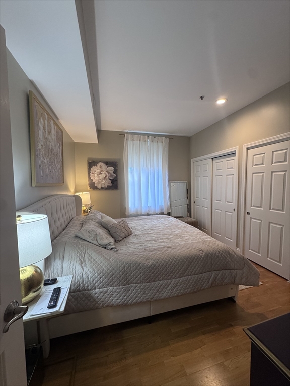 17 Central Street, Unit 9 Salem, MA 01970 - Photo 12 of 13 a bedroom with a bed and window