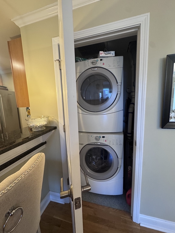 17 Central Street, Unit 9 Salem, MA 01970 - Photo 10 of 13 a view of a storage and utility room with washer and dryer