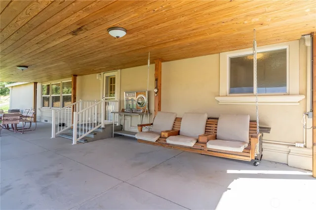 a view of yard with patio