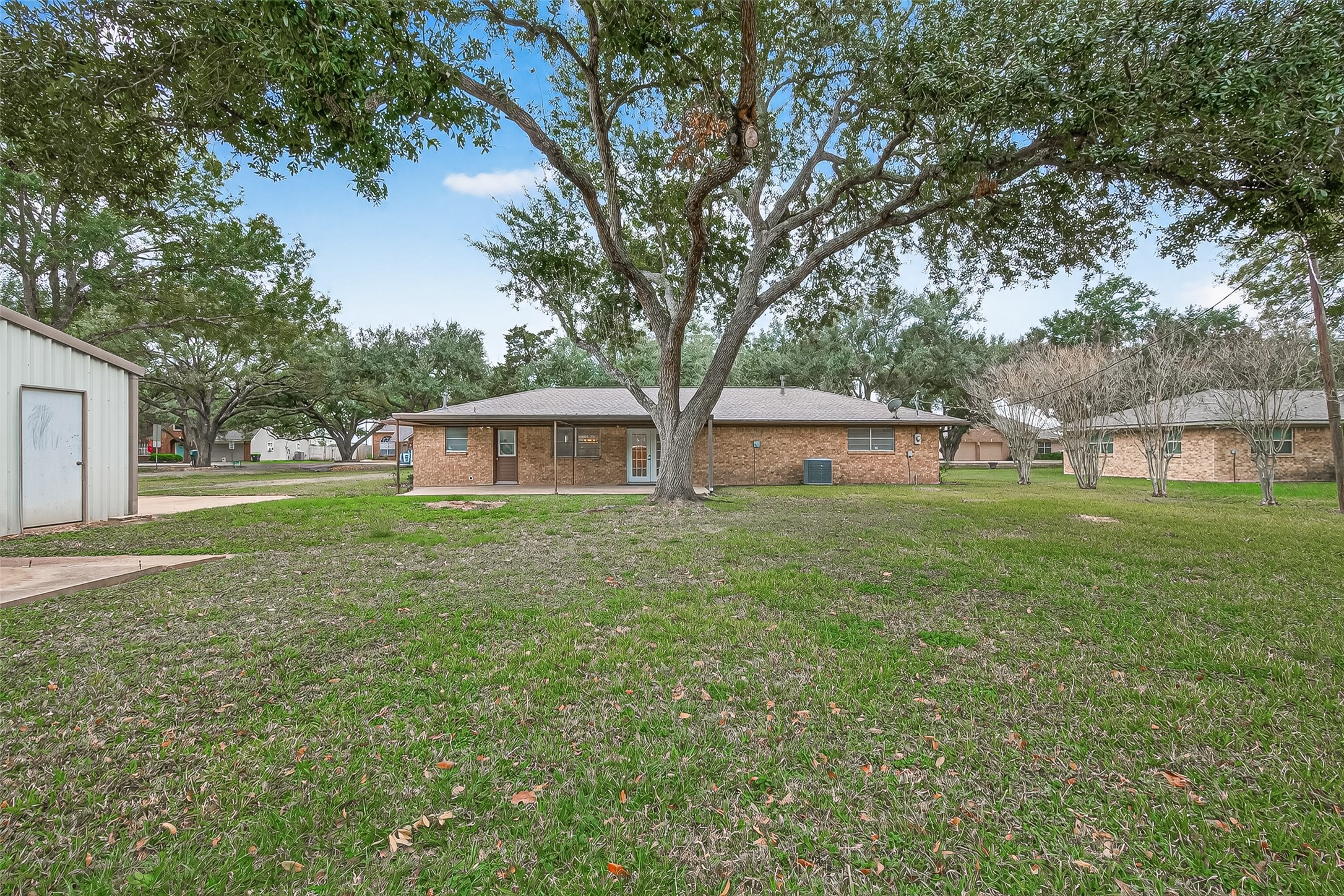 9525 Gene Street Needville, TX 77461 - Photo 43 of 48 front view of a house with a yard
