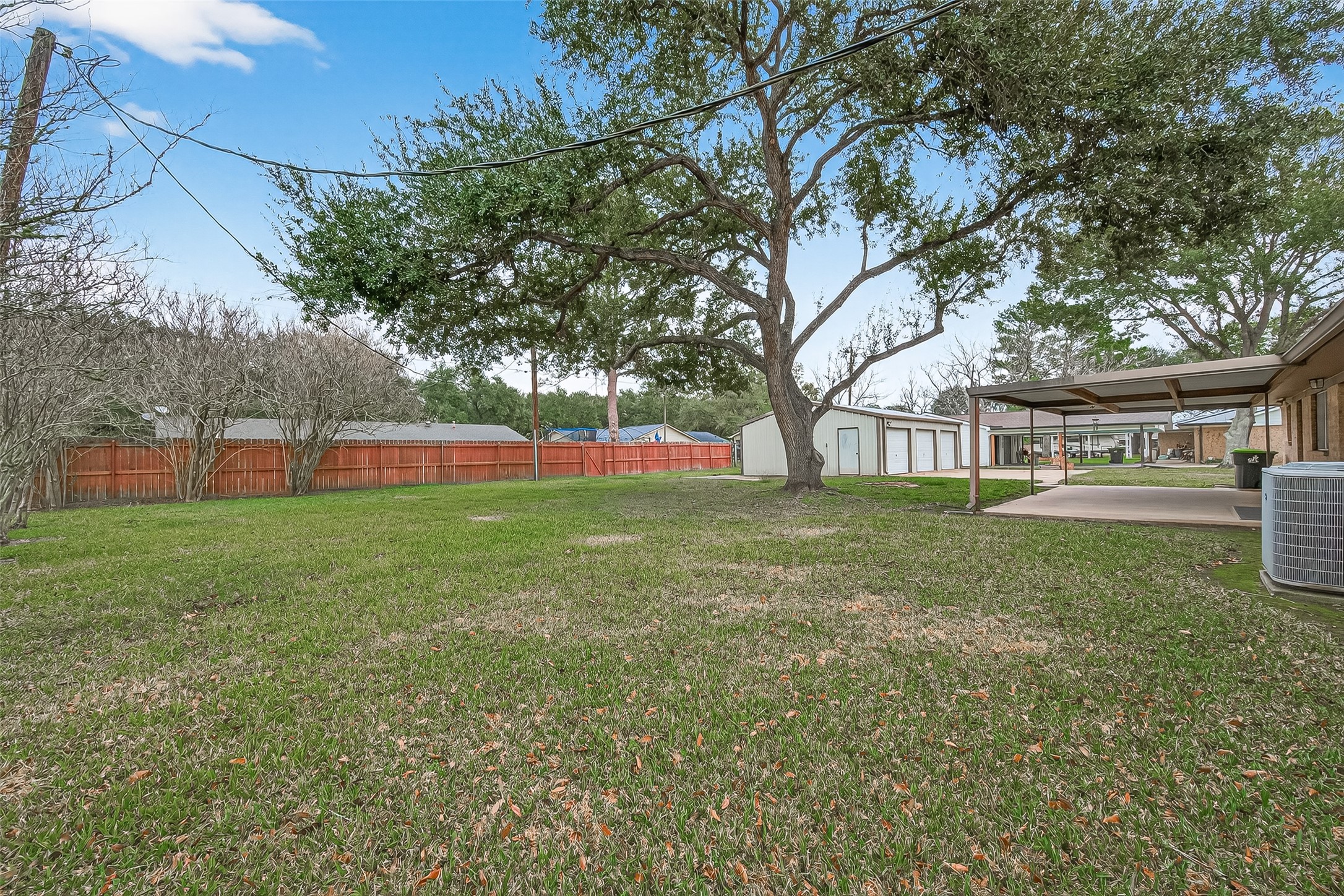 9525 Gene Street Needville, TX 77461 - Photo 45 of 48 a view of yard with green space and trees in the background