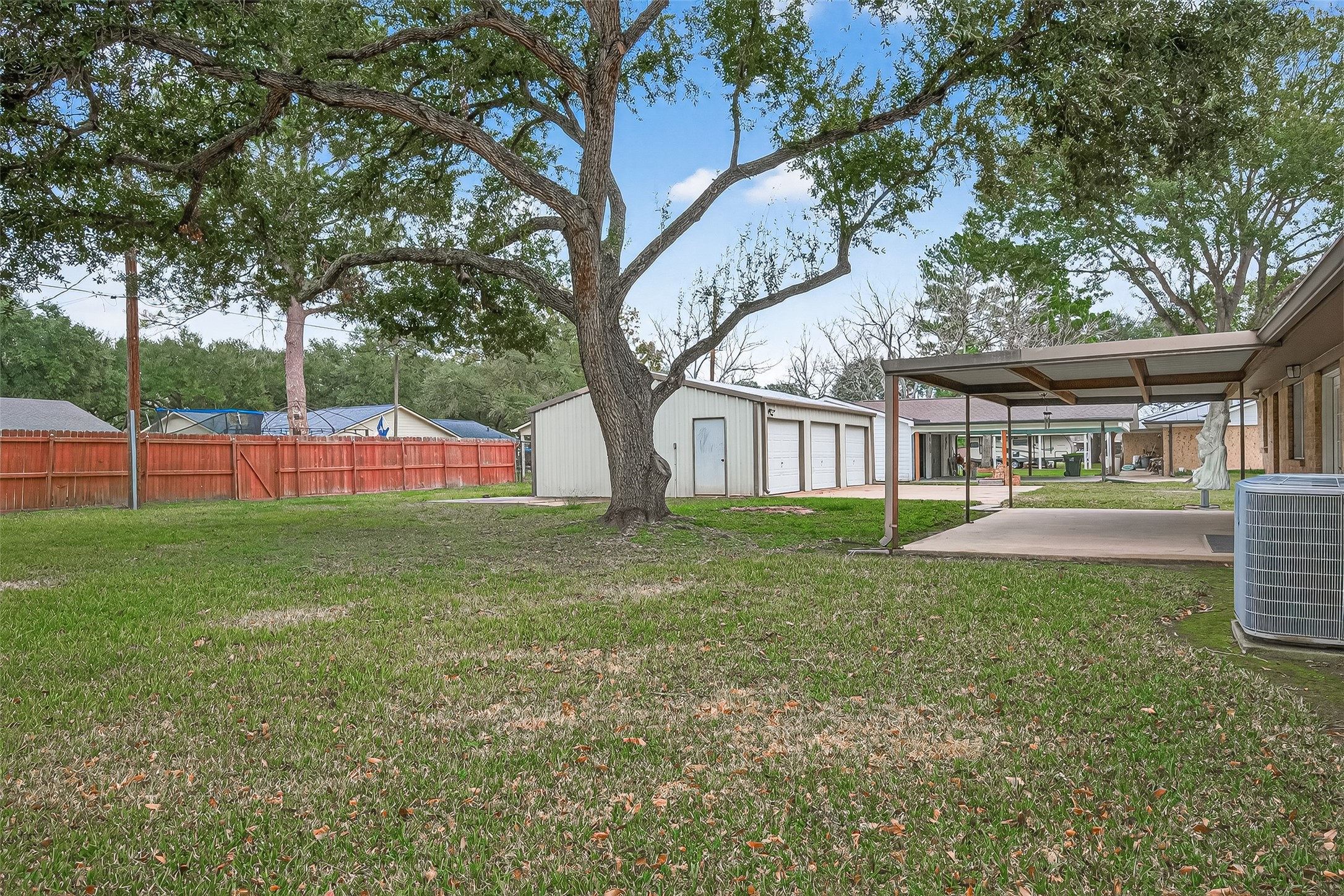 9525 Gene Street Needville, TX 77461 - Photo 46 of 48 a view of a house with a backyard