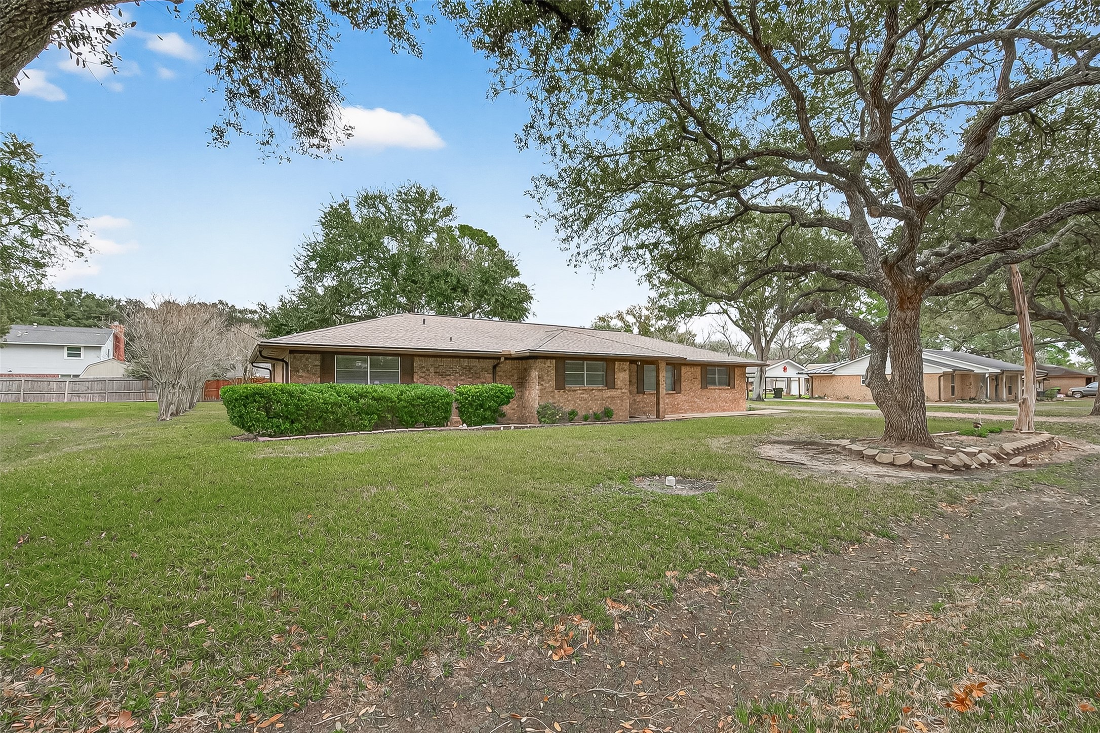 9525 Gene Street Needville, TX 77461 - Photo 5 of 48 a view of a house with a yard