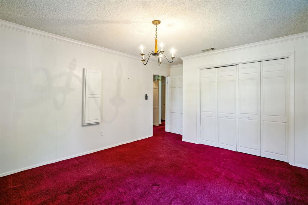 2617 Park Street Commerce, TX 75428 - Photo 18 of 34 wooden floor in an empty room with a window