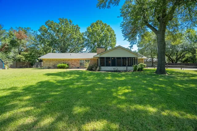 a view of a house with a big yard