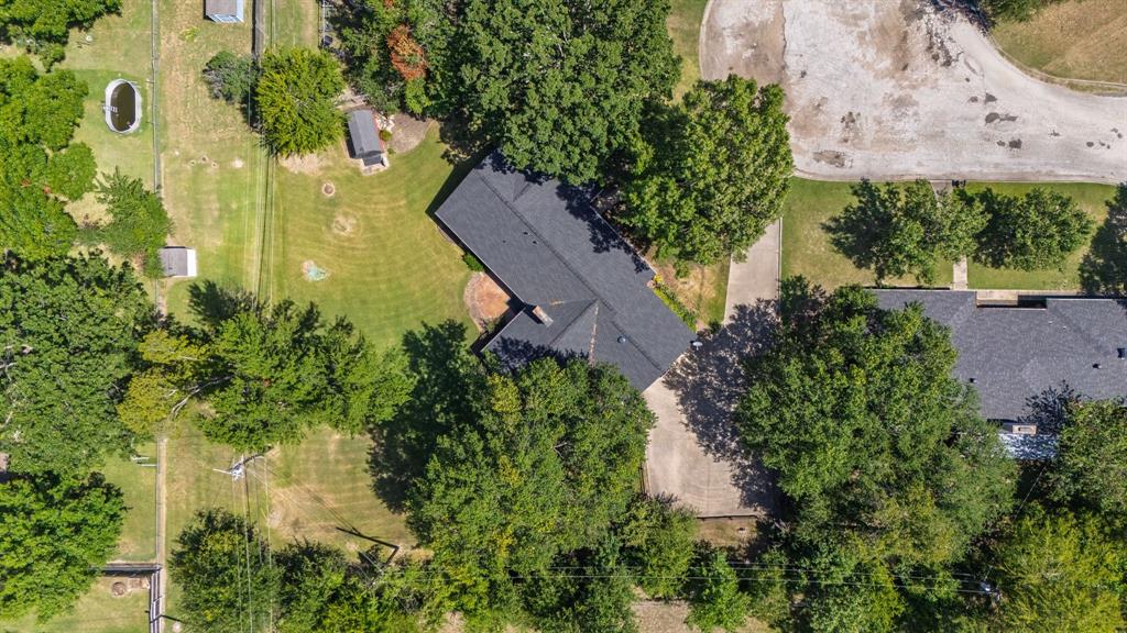 2617 Park Street Commerce, TX 75428 - Photo 32 of 34 an aerial view of a residential houses with outdoor space