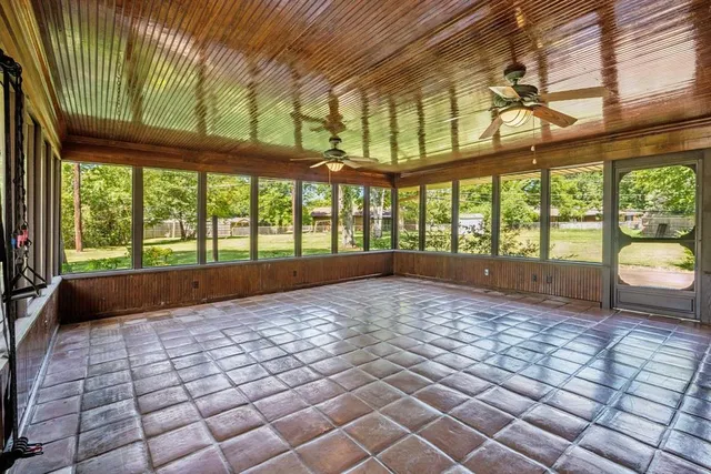 a view of an empty room and window