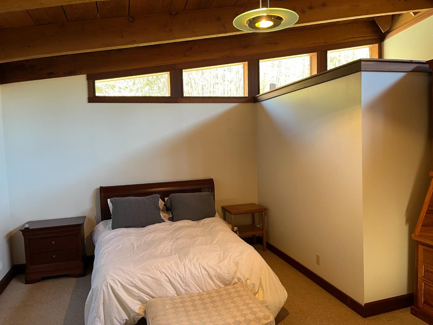 1557 Day Valley Road Aptos, CA 95003 - Photo 16 of 43 a bedroom with a bed and a window