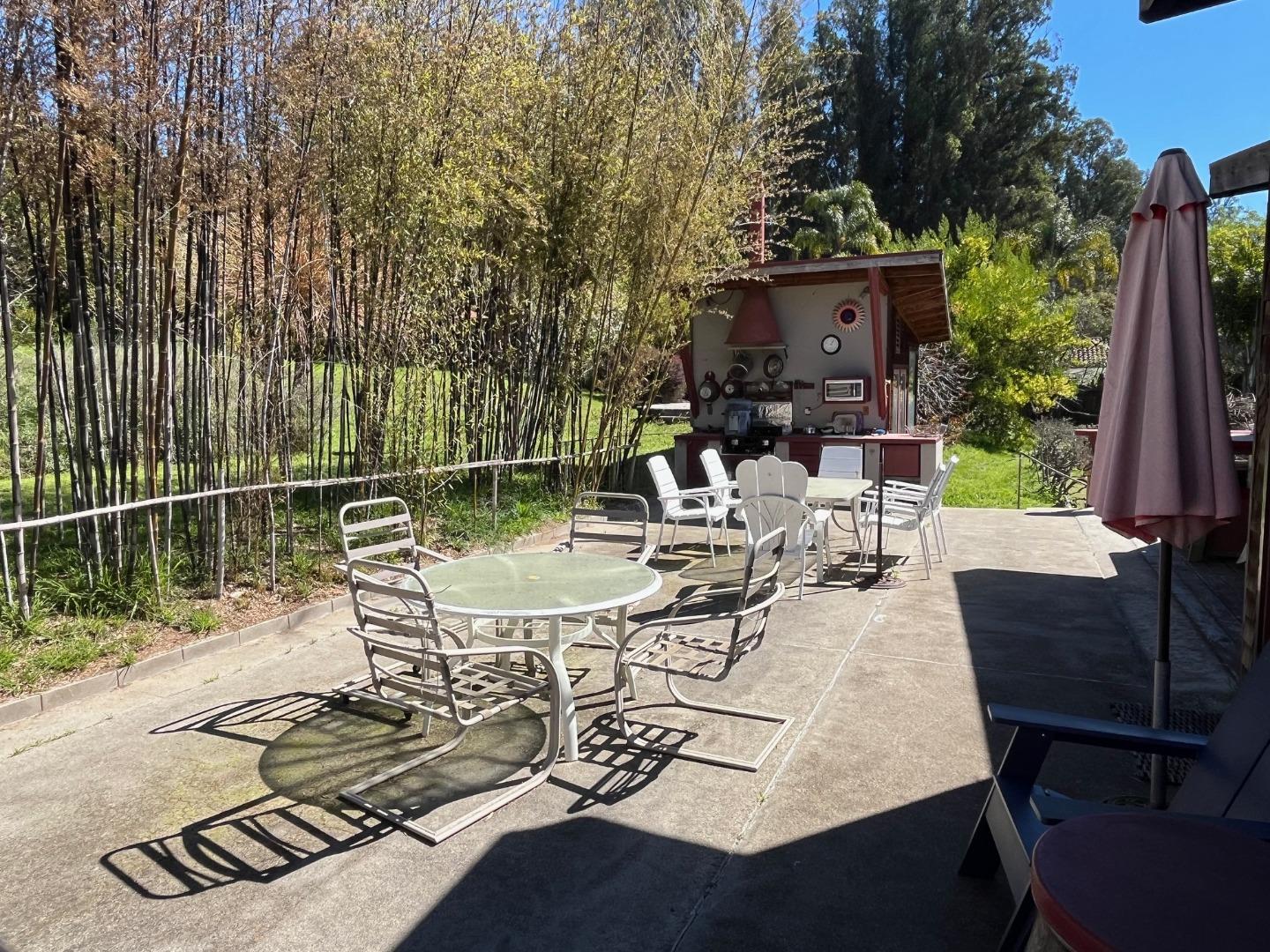 1557 Day Valley Road Aptos, CA 95003 - Photo 20 of 43 a view of a table and chairs in patio