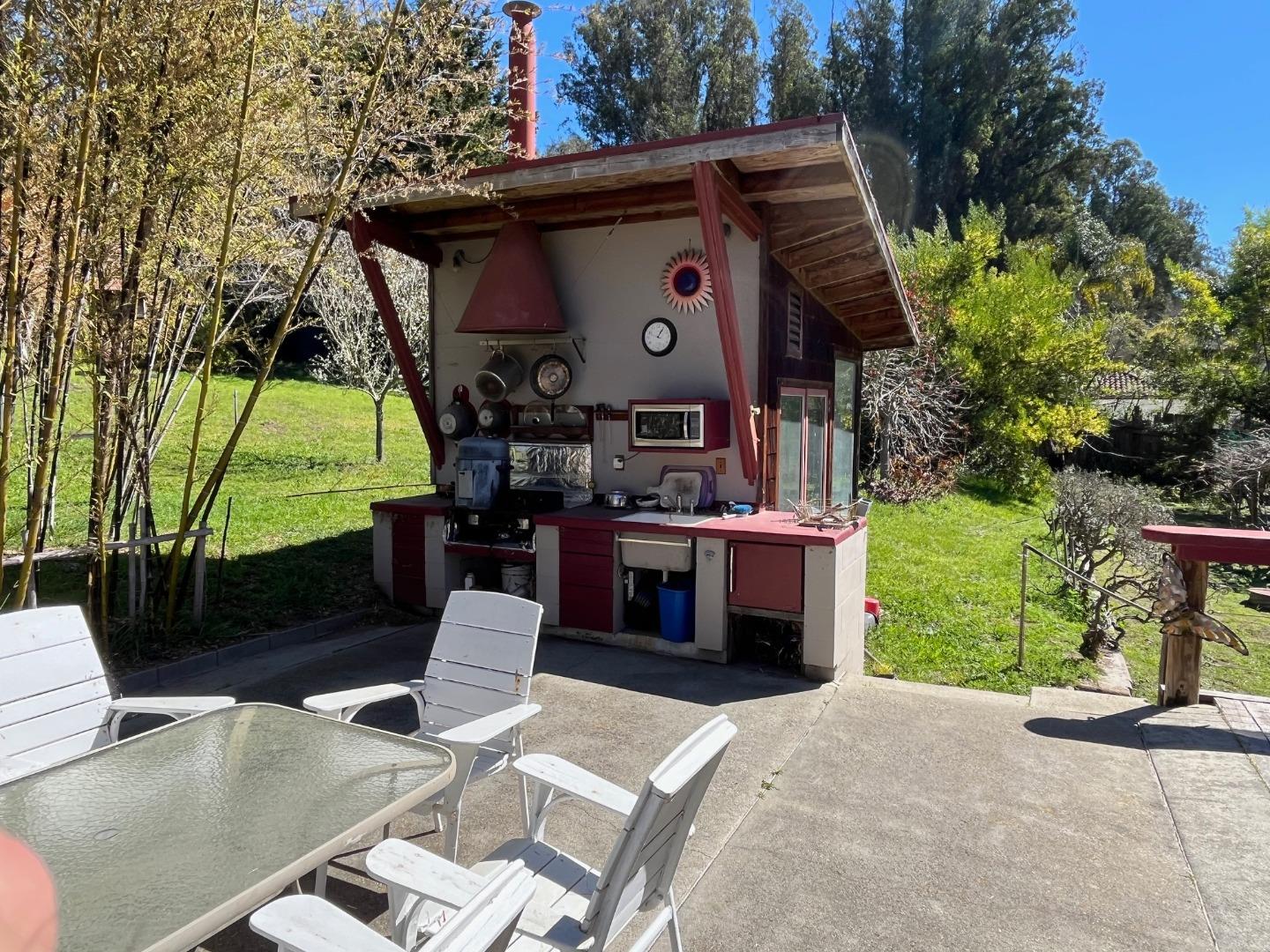 1557 Day Valley Road Aptos, CA 95003 - Photo 21 of 43 a front view of a house with a yard