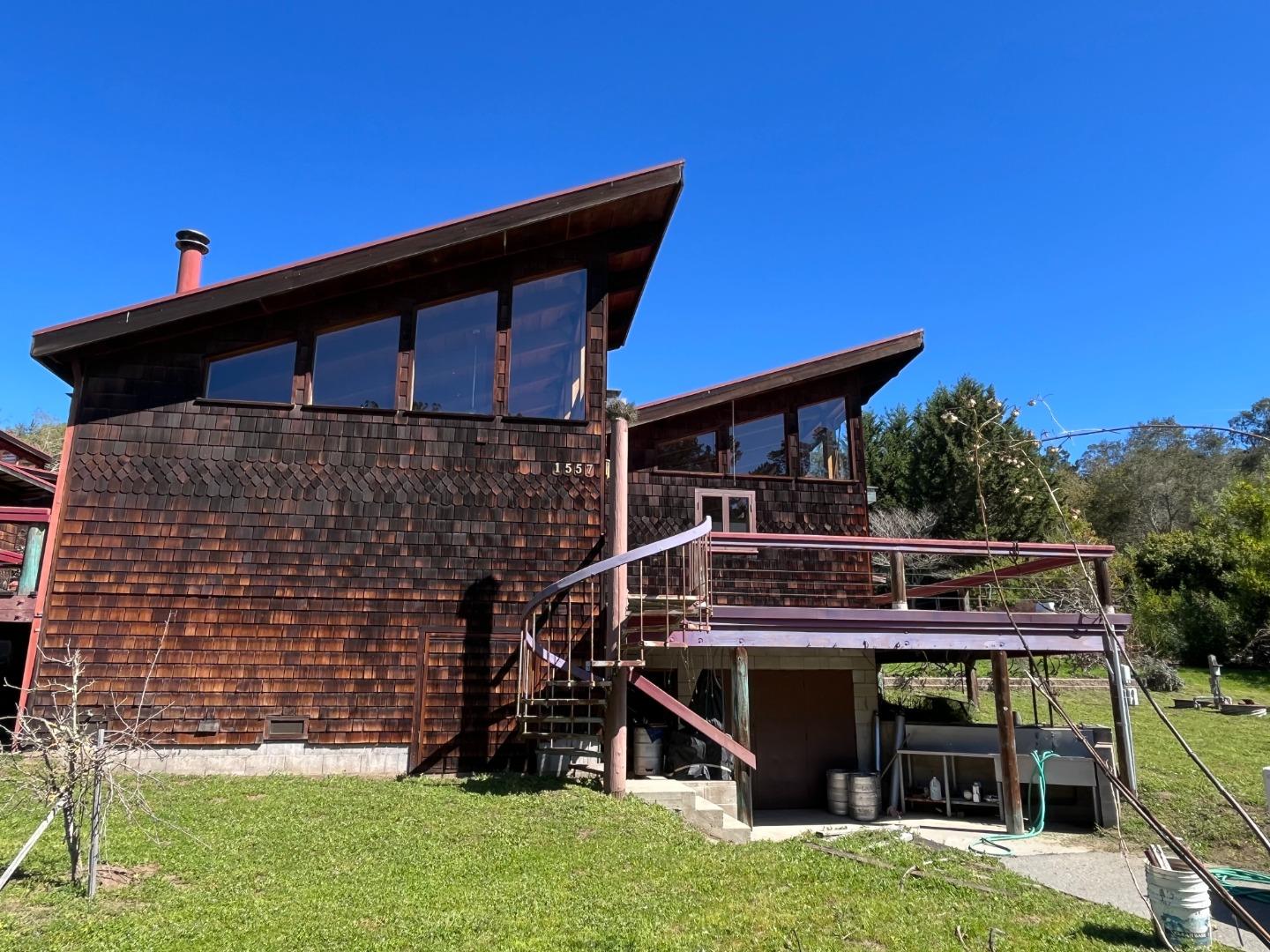 1557 Day Valley Road Aptos, CA 95003 - Photo 25 of 43 a front view of a house with a yard