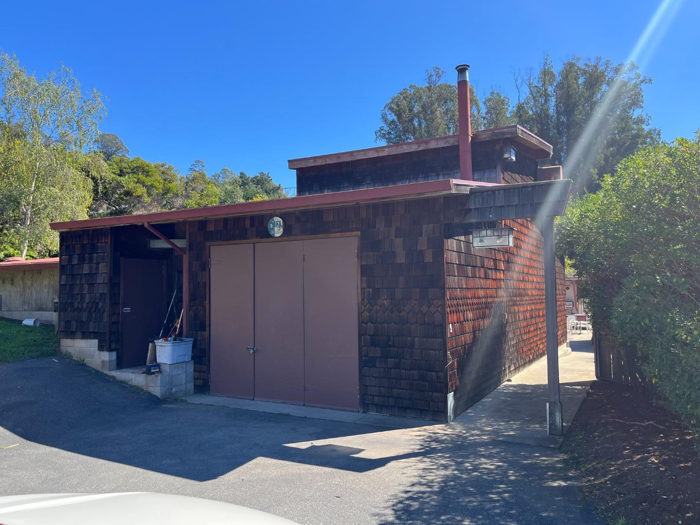 1557 Day Valley Road Aptos, CA 95003 - Photo 30 of 43 a front view of a house with a yard