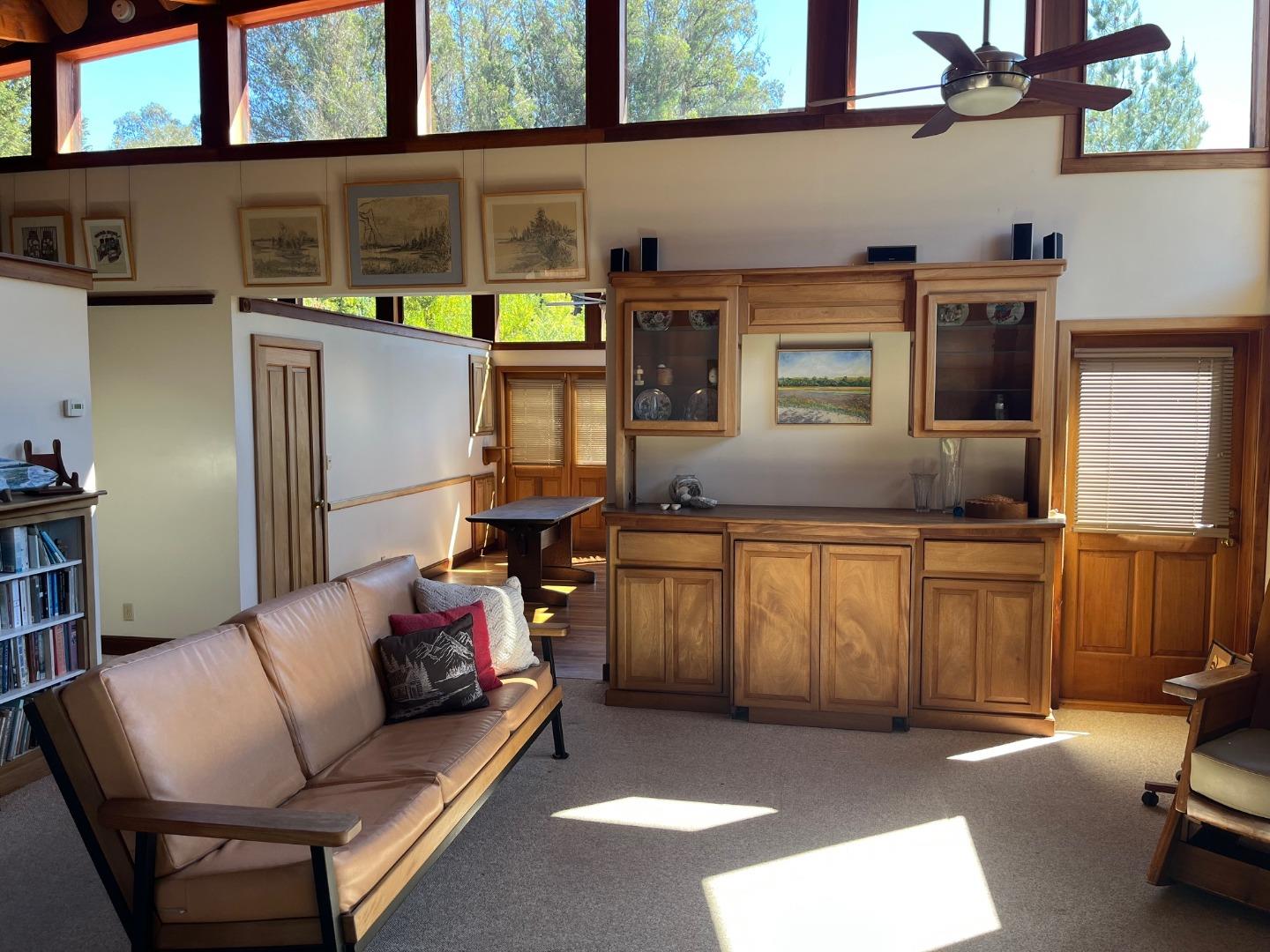 1557 Day Valley Road Aptos, CA 95003 - Photo 3 of 43 a living room with furniture a window and stainless steel appliances
