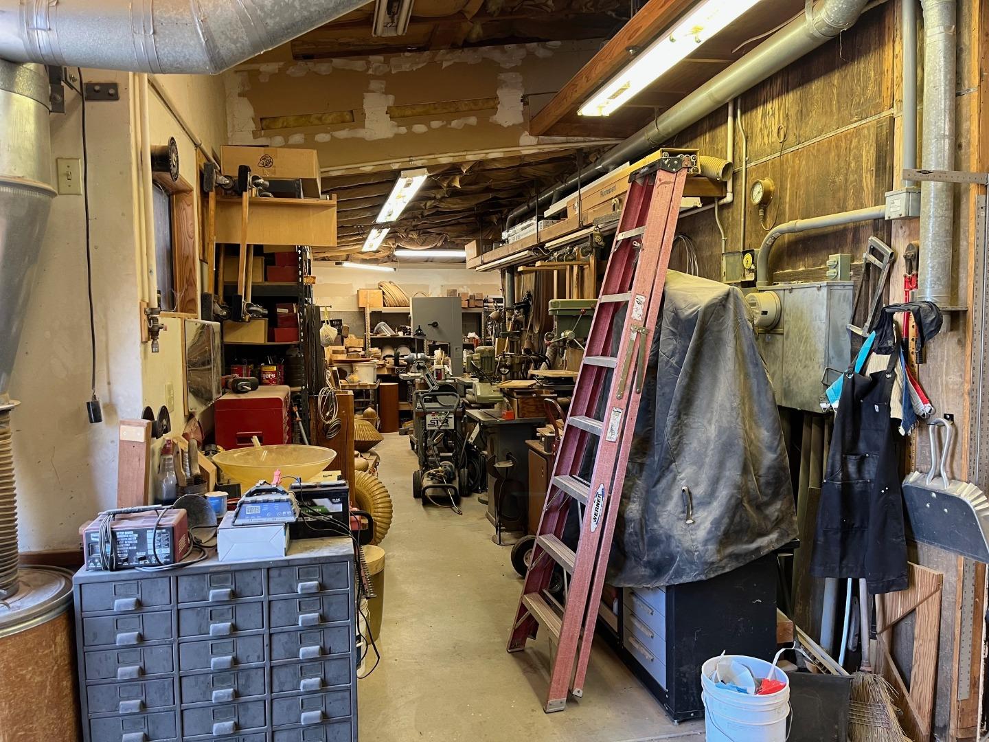 1557 Day Valley Road Aptos, CA 95003 - Photo 34 of 43 a view of walk in closet with clothes and shoes