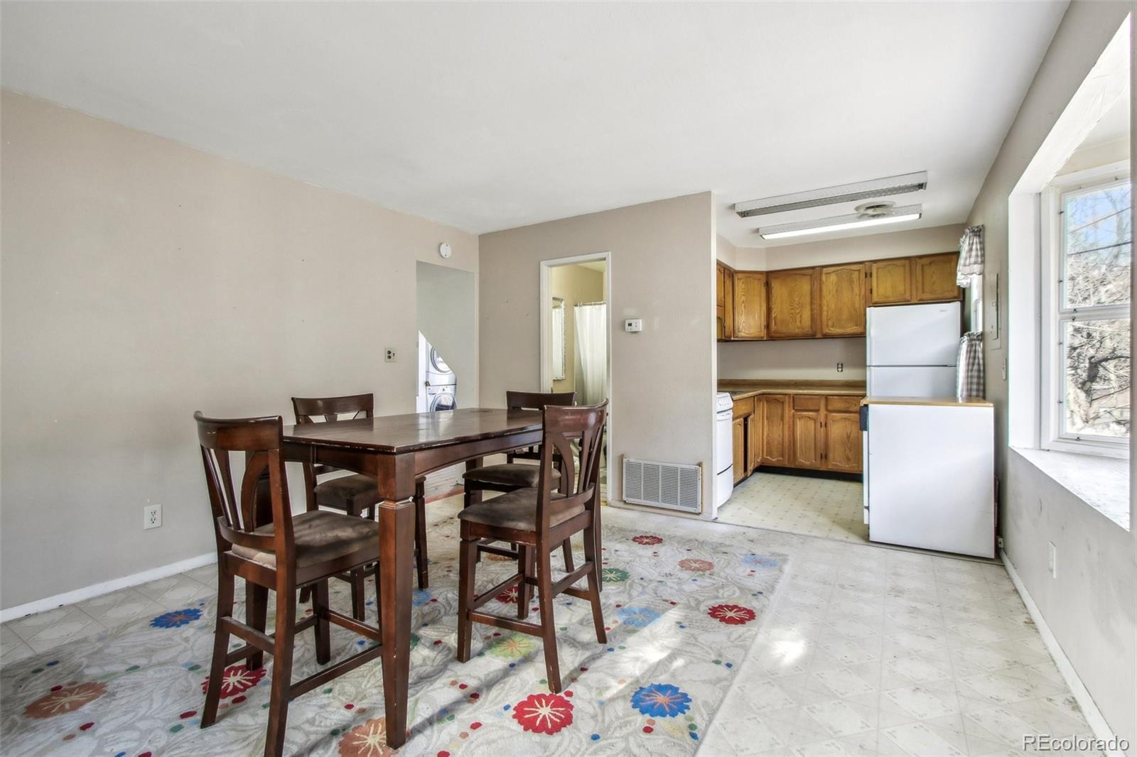 710 Sixth Street Georgetown, CO 80444 - Photo 15 of 25 a view of a dining room with furniture and a window
