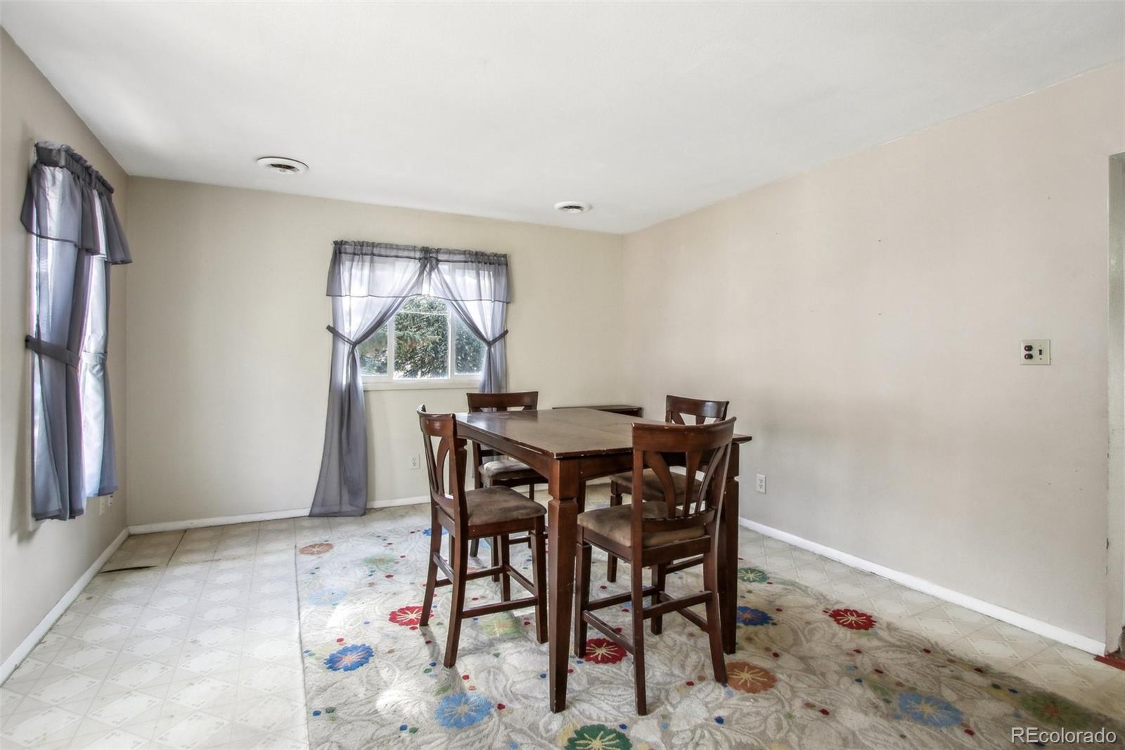 710 Sixth Street Georgetown, CO 80444 - Photo 16 of 25 a view of a dining room with furniture and window
