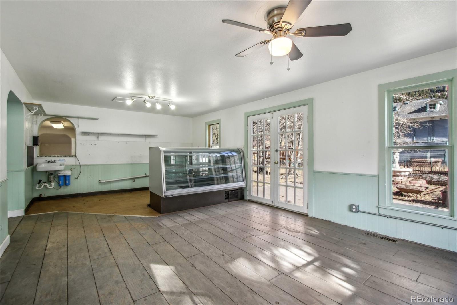 710 Sixth Street Georgetown, CO 80444 - Photo 8 of 25 a view of a livingroom with furniture and chandelier fan