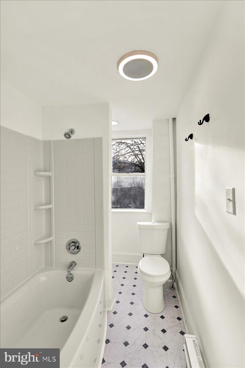 32 South Front Street St. Clair, PA 17970 - Photo 14 of 30 a bathroom with a bathtub sink and toilet
