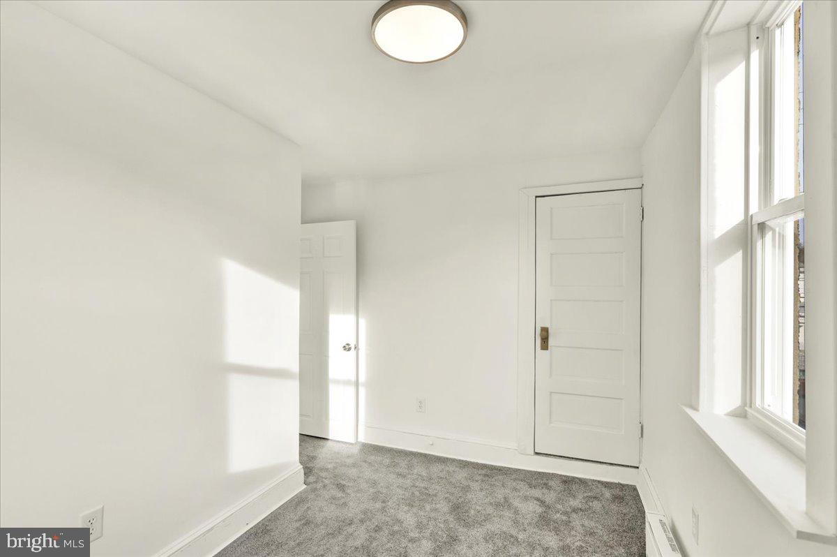 32 South Front Street St. Clair, PA 17970 - Photo 17 of 30 an empty room with windows and closet