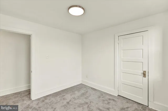 an empty room with closet