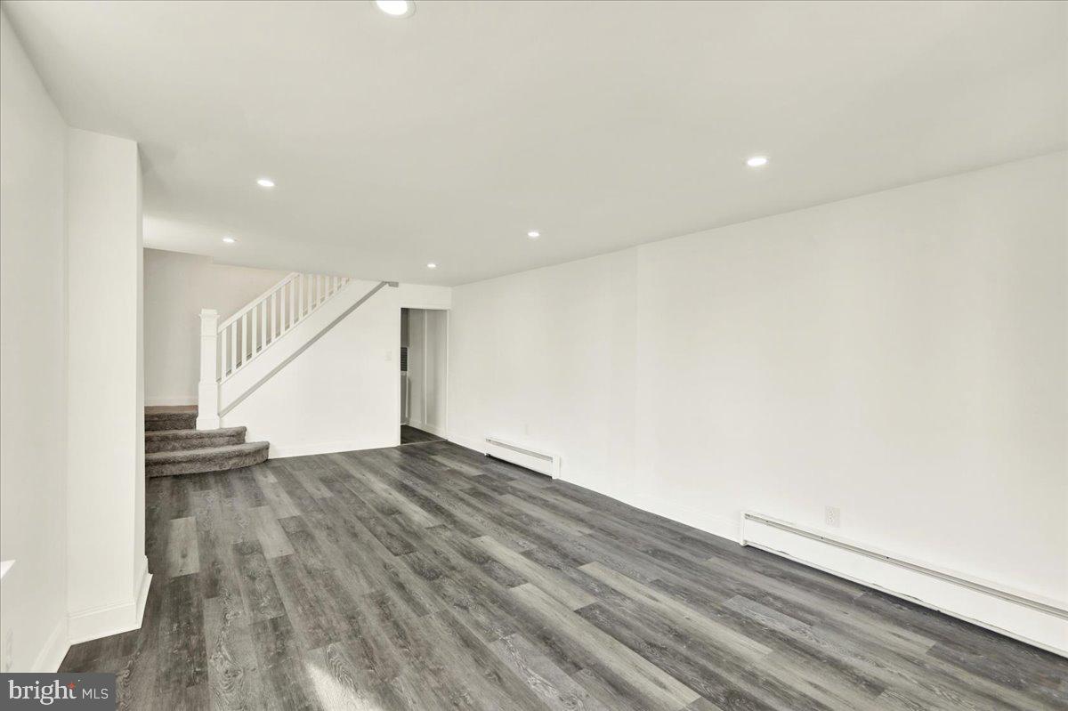 32 South Front Street St. Clair, PA 17970 - Photo 9 of 30 a view of an empty room with wooden floor