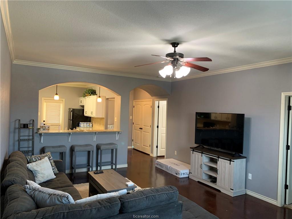 3203 Corporal Road College Station, TX 77845 - Photo 14 of 29 a living room with furniture and a flat screen tv