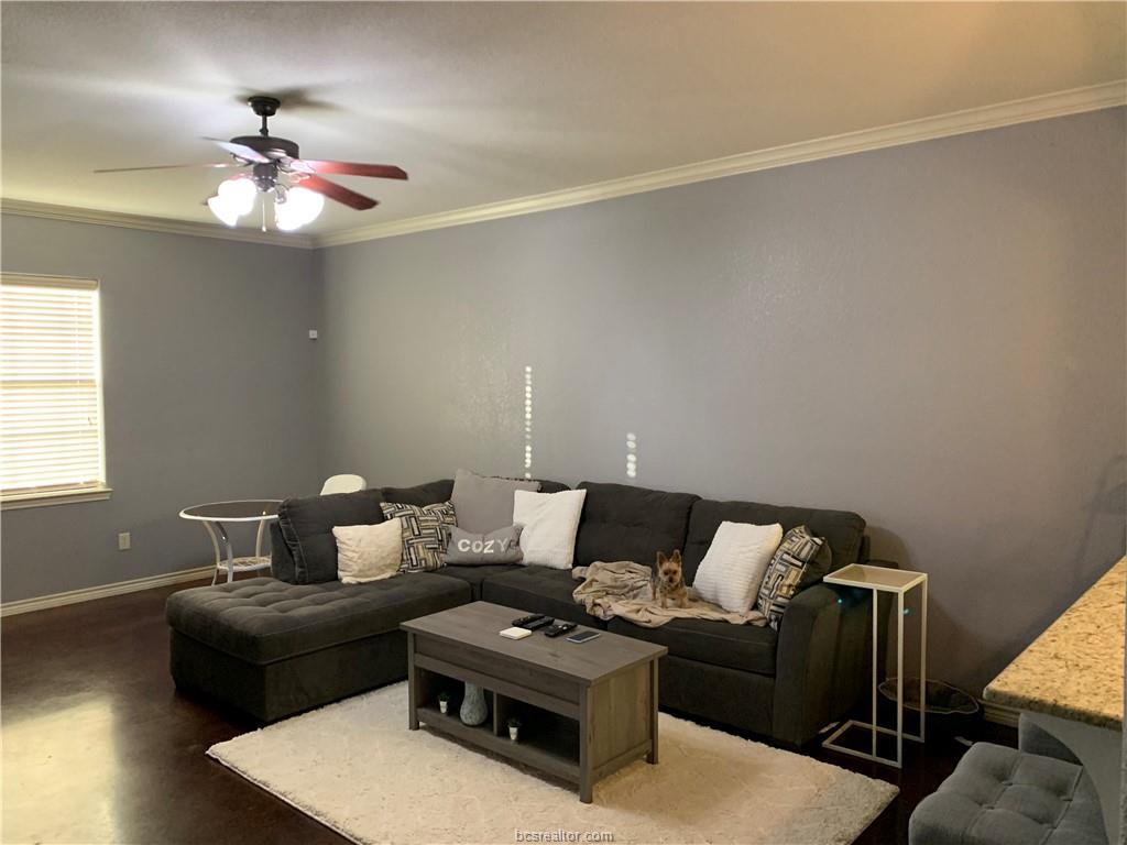 3203 Corporal Road College Station, TX 77845 - Photo 15 of 29 a living room with furniture and a chandelier