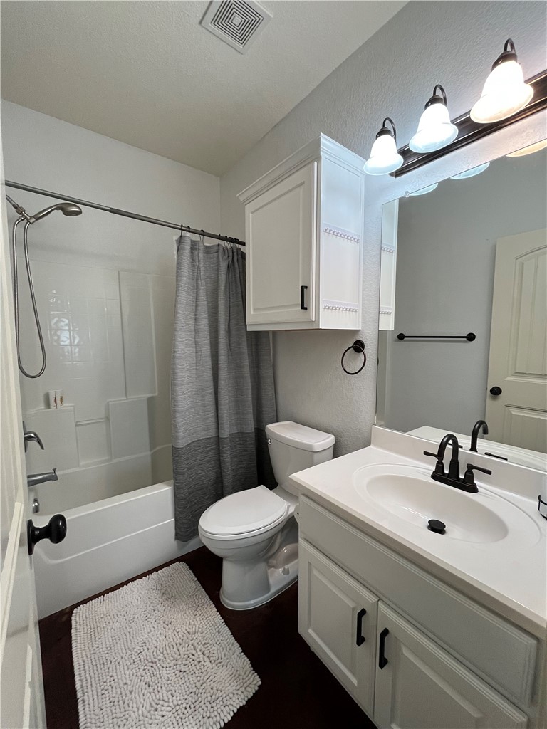 3203 Corporal Road College Station, TX 77845 - Photo 25 of 29 a bathroom with a sink toilet and shower