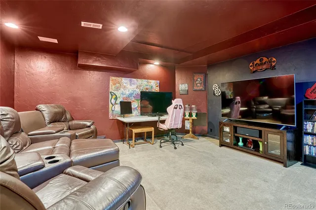 a balcony with furniture and wooden floor