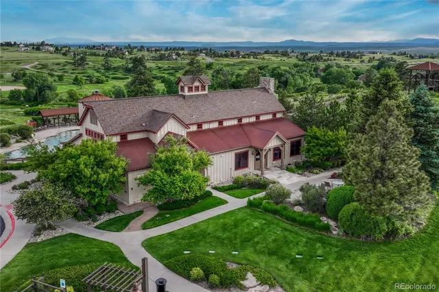 an aerial view of a house with a garden