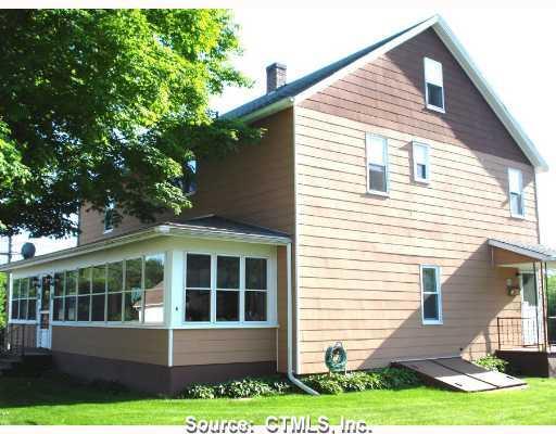 16 Packerville Road Plainfield, CT 06374 - Photo 1 of 1 a front view of a house with a yard