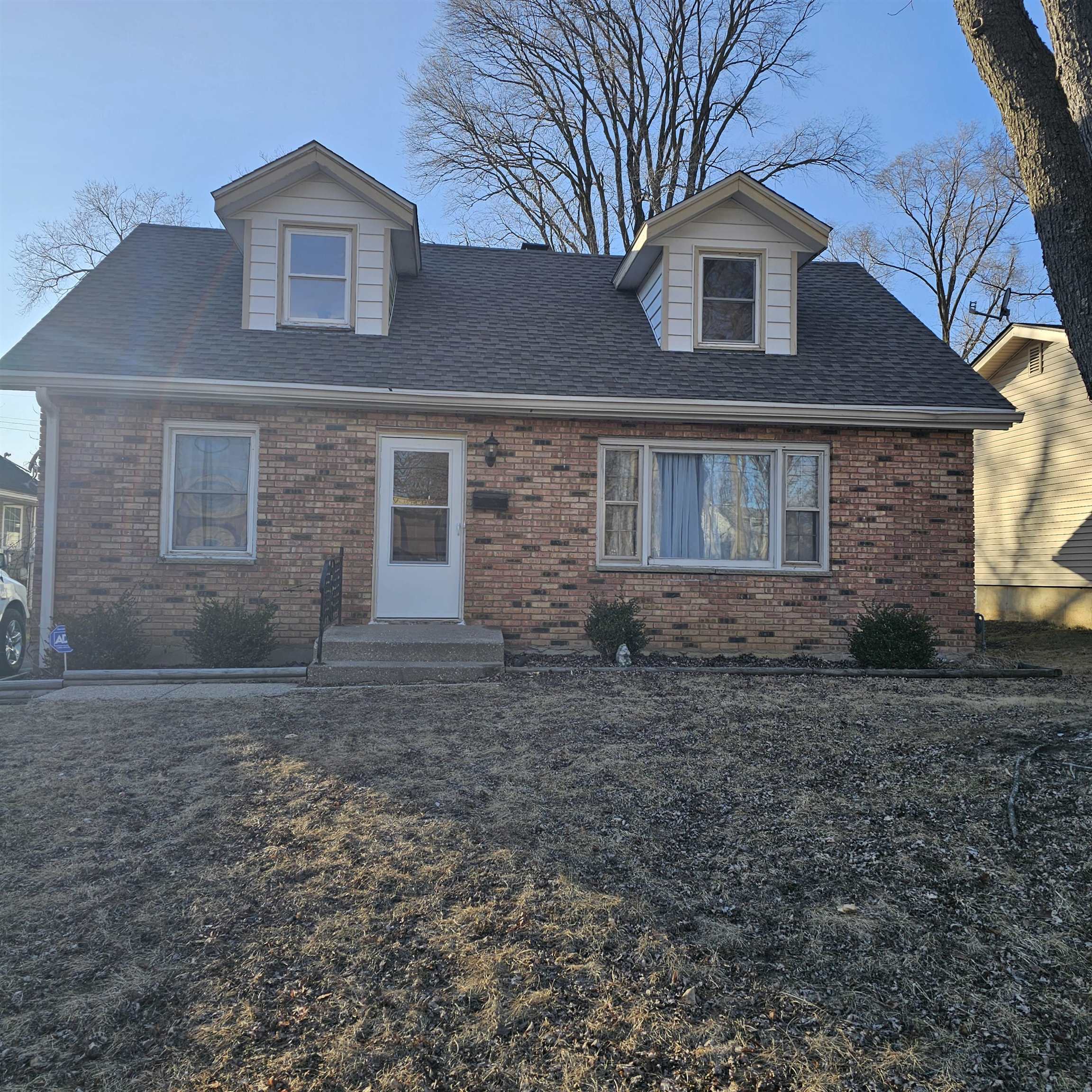1925 Remington Road Rockford, IL 61108 - Photo 1 of 14 a front view of a house with yard